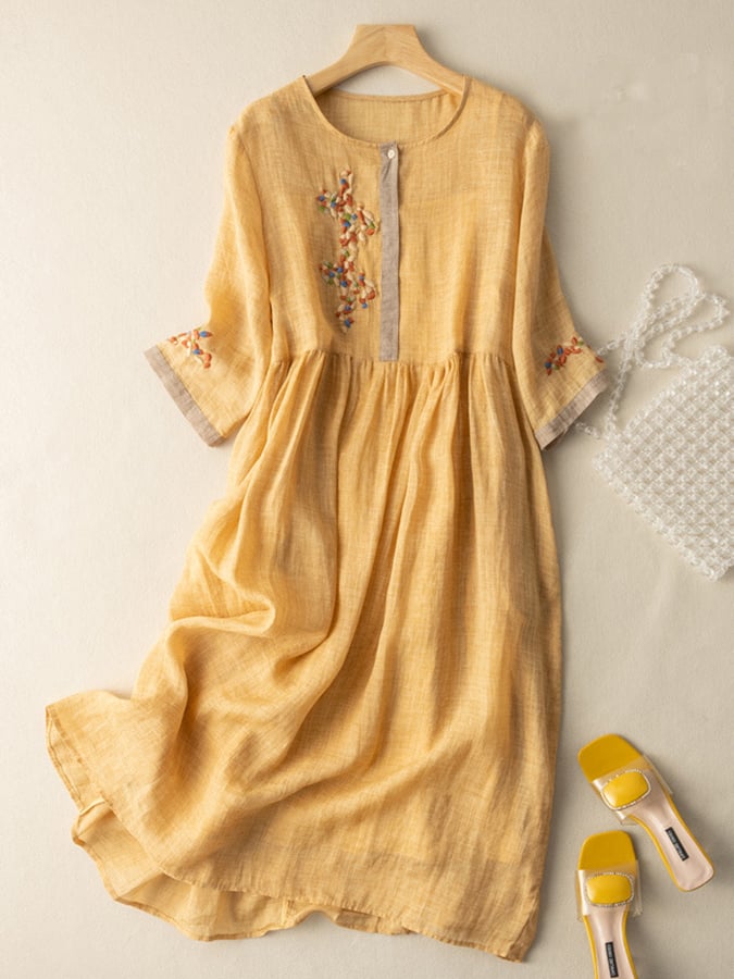 Women's embroidered boho midi dress with elegant relaxed fit. Perfect for casual summer & spring fashion.