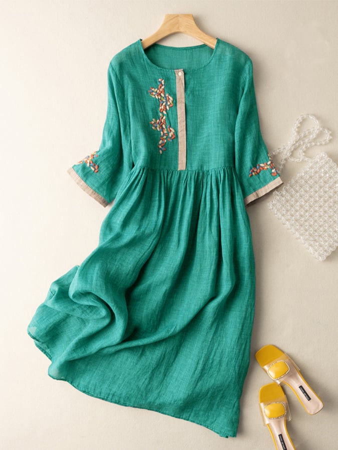 Blue embroidered boho midi dress for women, featuring a relaxed fit and round neck. Ideal for summer casual style.