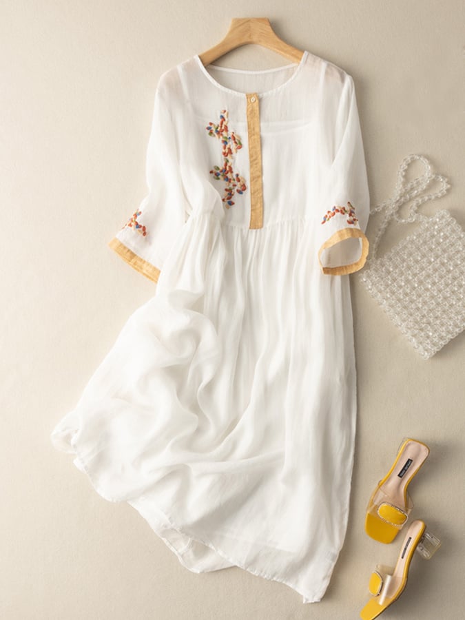 Yellow embroidered boho dress, a women's midi with a loose fit & elegant design. Perfect spring/summer fashion.