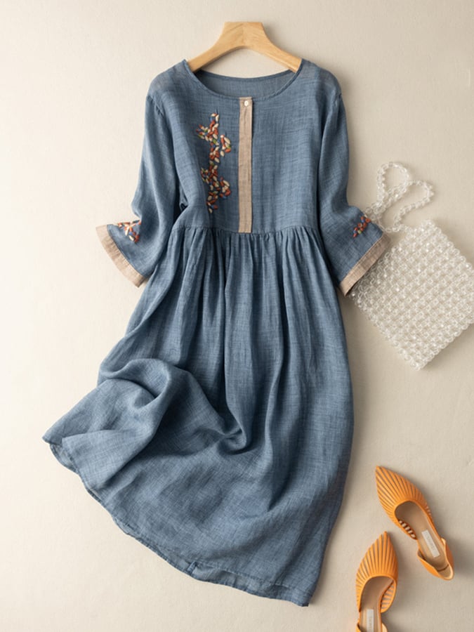 White embroidered boho midi dress for women. Features a relaxed, elegant fit & beautiful details for spring/summer.