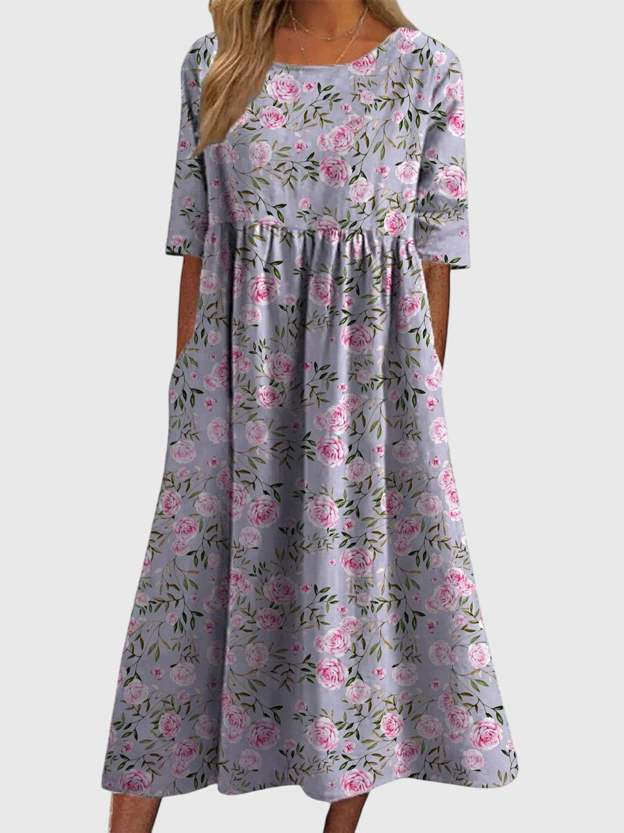 Elegant women's embroidered flowy midi dress, a versatile and comfortable choice for summer and special occasions.