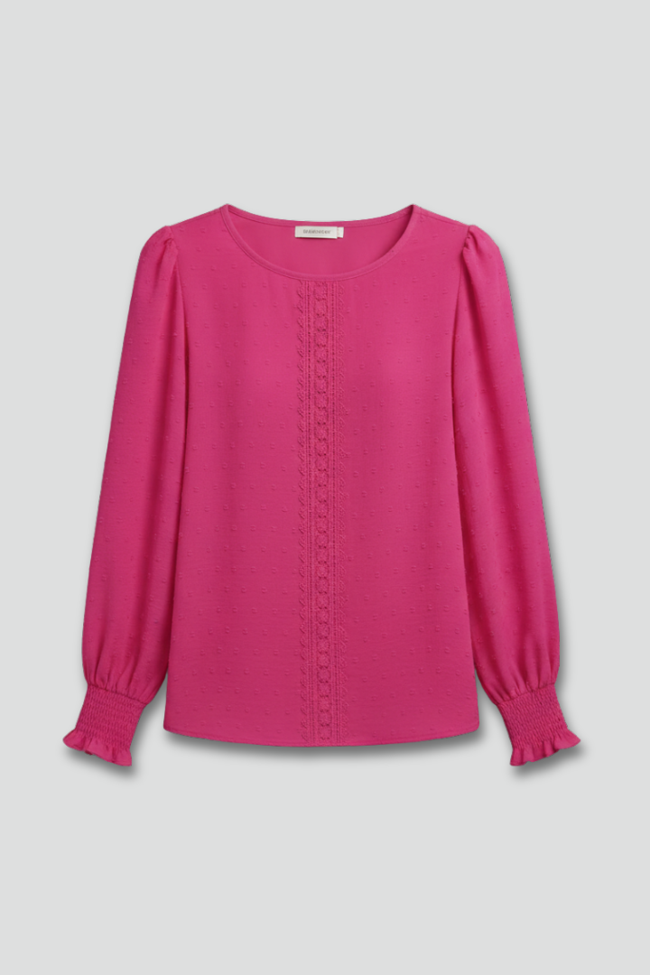 Women's embroidered long sleeve round neck blouse, elegant for spring/fall fashion.
