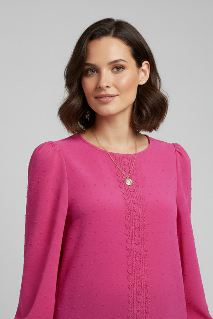 Versatile women's embroidered long sleeve round neck blouse, easily styled for many occasions.