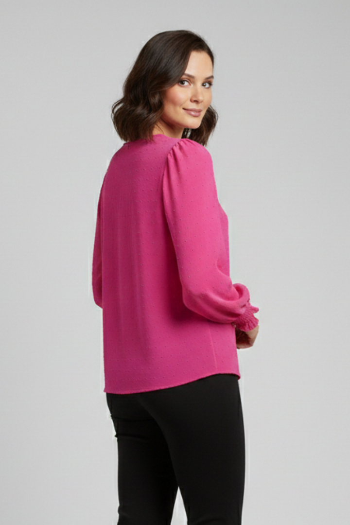 White women's embroidered long sleeve round neck top, delicate pattern, perfect for womenswear.