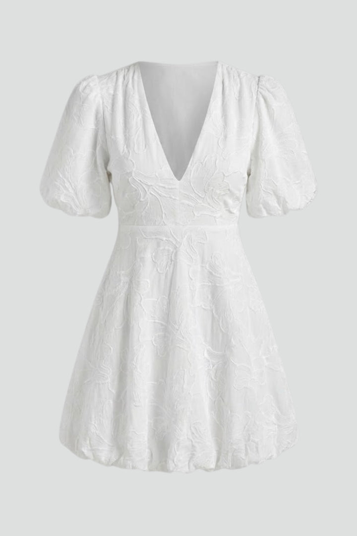 Women's embroidered puff sleeve mini dress with floral pattern, V-neck, and bubble hem. Perfect for spring & summer.
