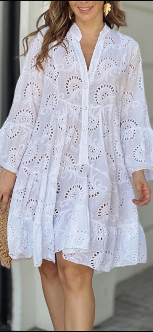 Boho style tiered mini dress for women, with eyelet embroidery & flowy bell sleeves.