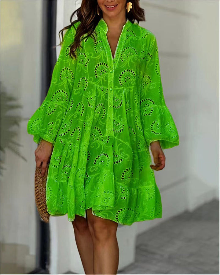 Fashionable A-line tiered mini dress for women, with detailed embroidery & elegant bell sleeves.