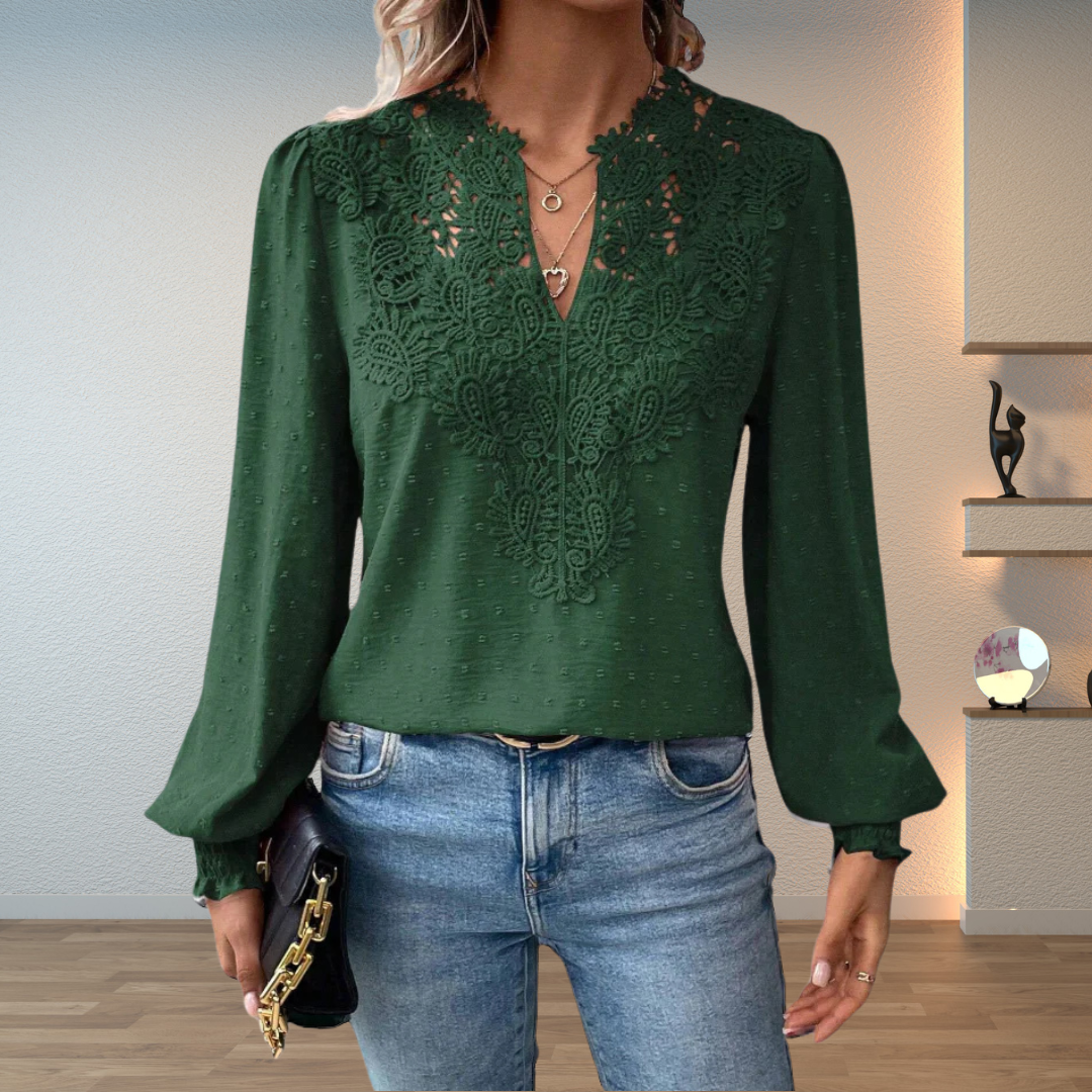 Fashionable women's V-neck blouse with embroidered details and elegant puff long sleeves.