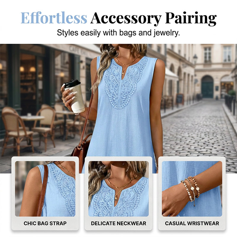 Model wearing a relaxed fit V-neck embroidered midi dress. Perfect casual elegance for women.