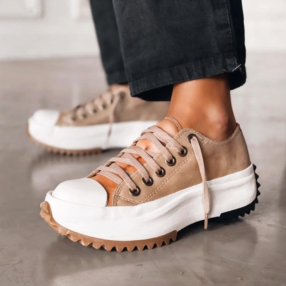 Lightweight Women's Emery sneakers, cushioned for all-day comfort, providing arch support for active lifestyles.