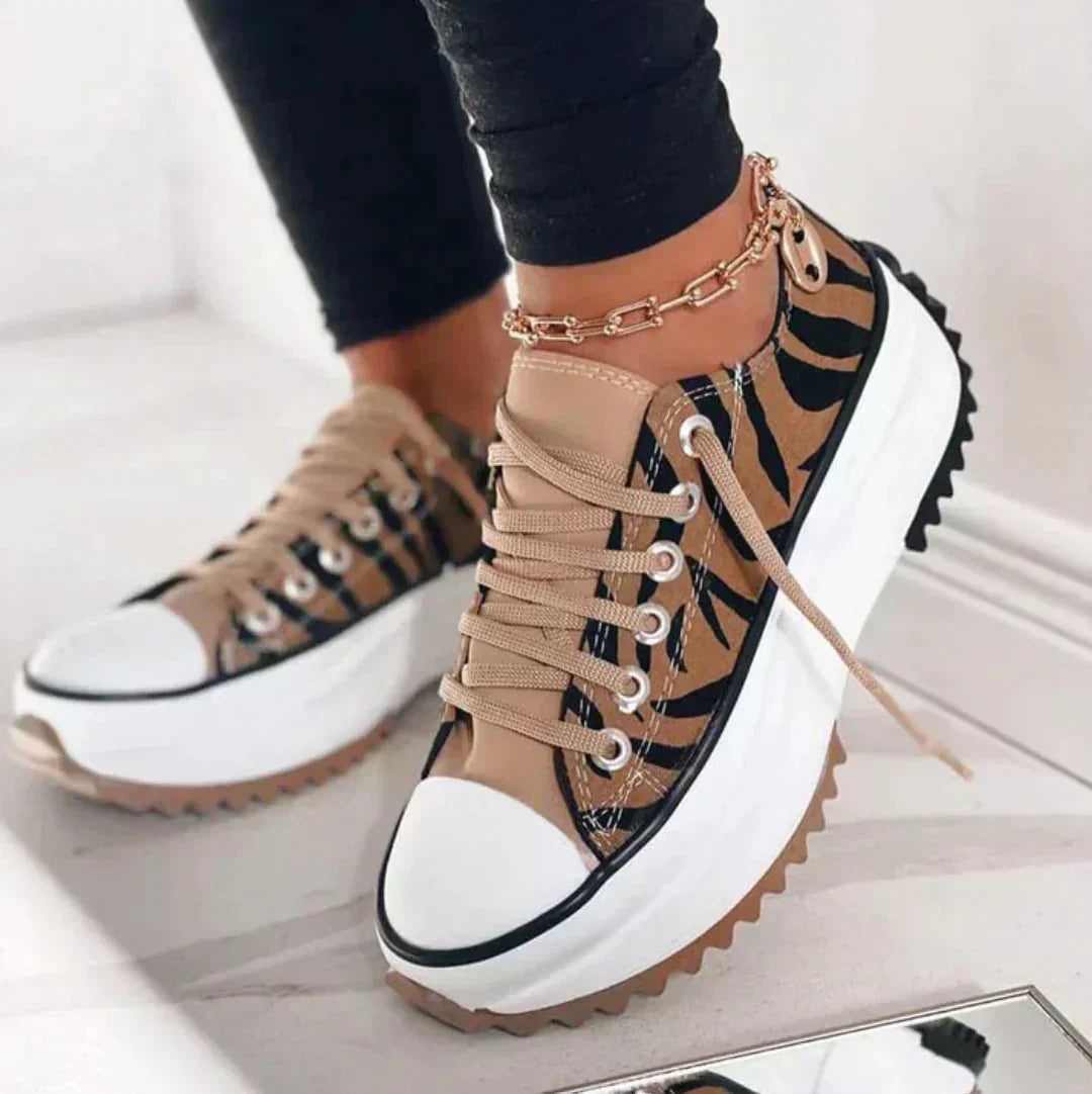 Athletic Women's Emery sneakers, ideal for walking. Features lightweight design, cushioning & excellent arch support.
