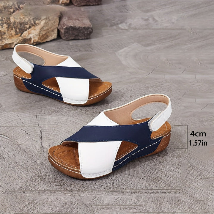 Comfortable women's sandals with ergonomic design, arch support, & cushioning. Ideal summer footwear for daily wear.