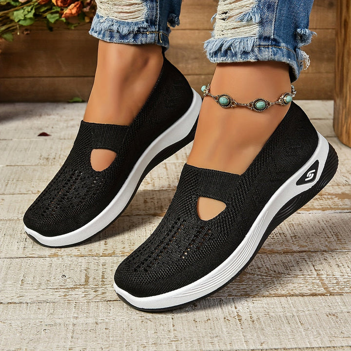 Women's casual slip-on sneakers featuring ergonomic comfort & cushioned sole for daily wear.