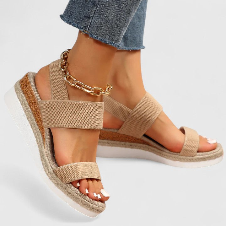 Women's espadrille wedge sandals with comfortable elastic straps, perfect for casual summer style.