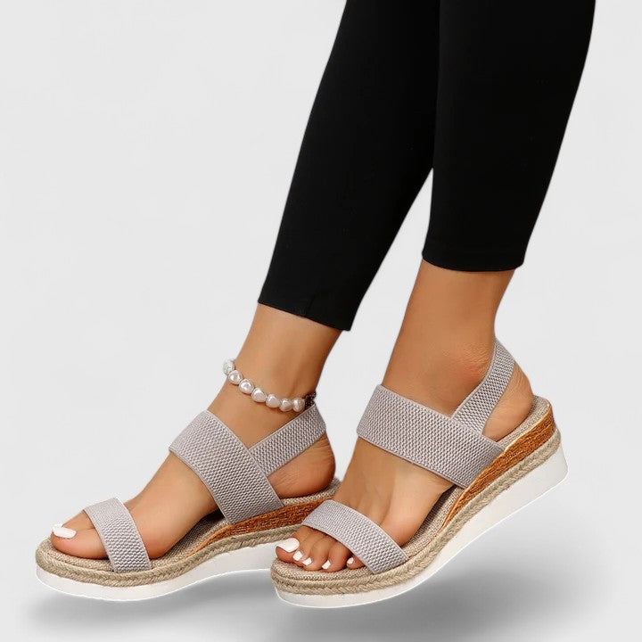 Stylish women's espadrille wedge sandals, open-toe and elastic strap for ultimate summer comfort.