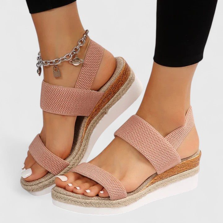 Effortless women's espadrille wedge sandals with elastic straps, perfect for versatile summer looks.