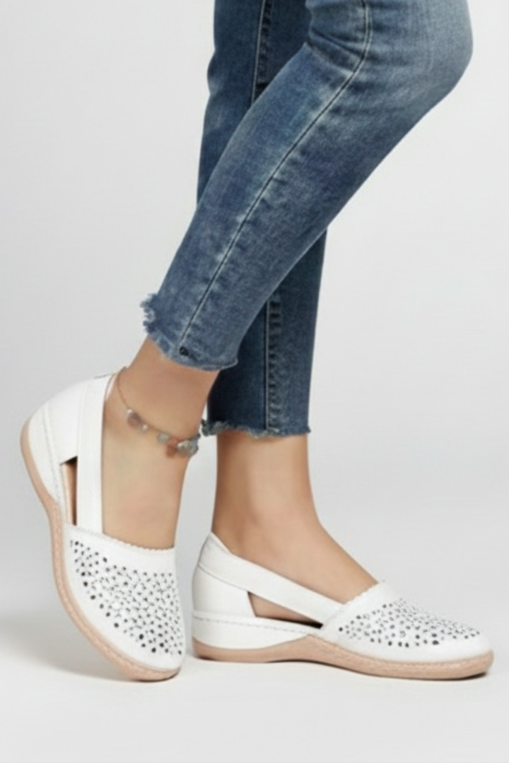 Lightweight women's shoes with unique breathable cut-outs, providing fresh comfort for daily walks.