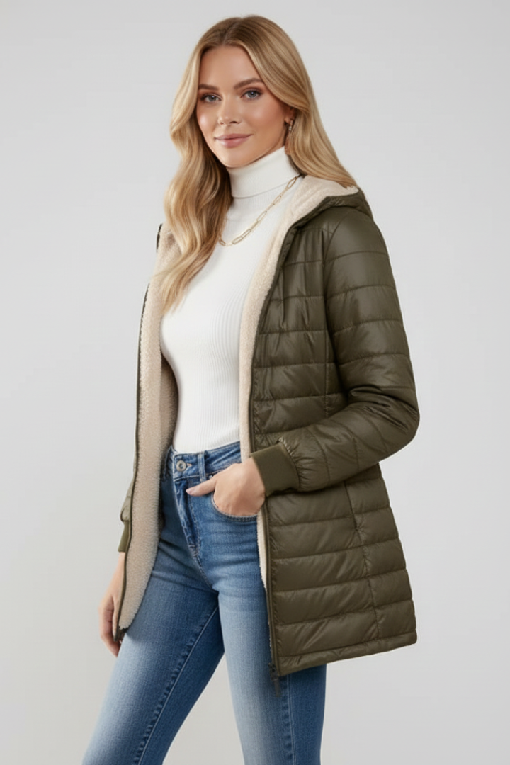 Stylish women's hooded zip jacket. Versatile casual outerwear for everyday comfort in ladies' fashion.