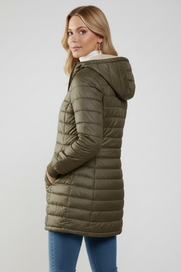 Ladies' everyday hooded zip jacket, perfect for casual comfort. Essential outerwear for fall and spring.