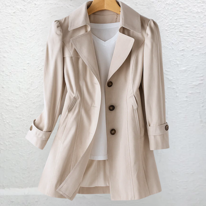 Women's fitted belted trench coat with structured collar, elegant long design, perfect for fall workwear.