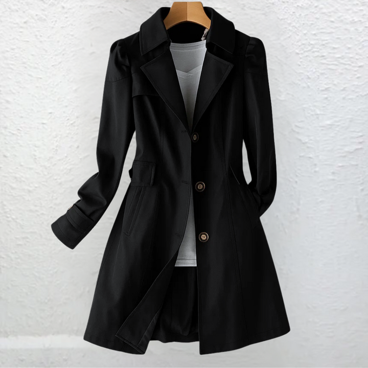 Stylish women's belted trench coat with a structured collar, offering a classic & sophisticated look for spring.
