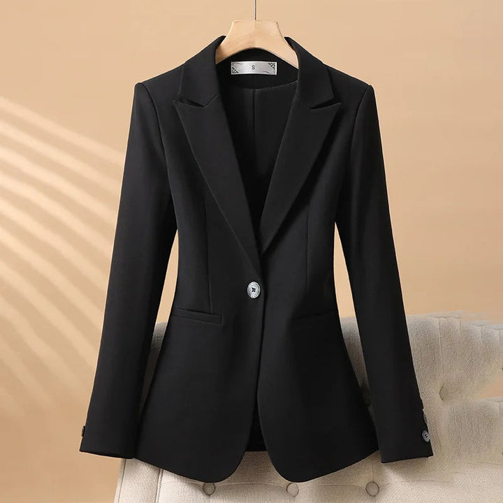 Sophisticated women's tailored blazer, a chic fitted jacket with notch lapel, perfect for elegant office wear or events.