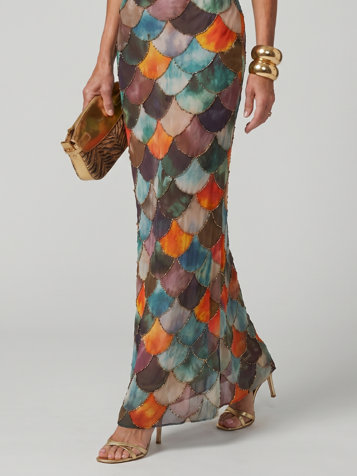 Elegant women's pull-on maxi halter dress, striking geometric print. Great for summer parties and events.