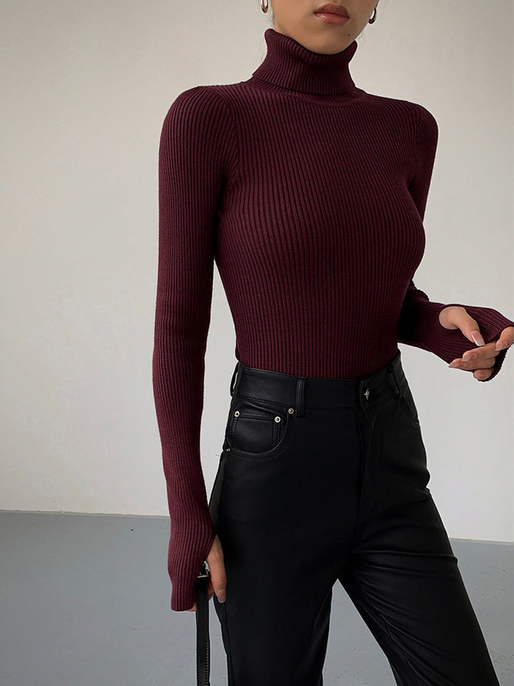 Side view of a women's spring casual ribbed turtleneck sweater, highlighting the comfortable knit fabric.