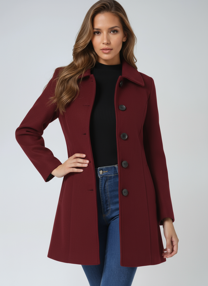 Tailored women's winter trench coat with a secure button closure, providing a chic & warm professional outerwear option.