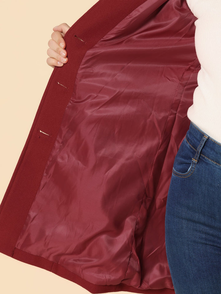 Professional women's trench coat with a clean, fitted silhouette and classic button details, suitable for office.