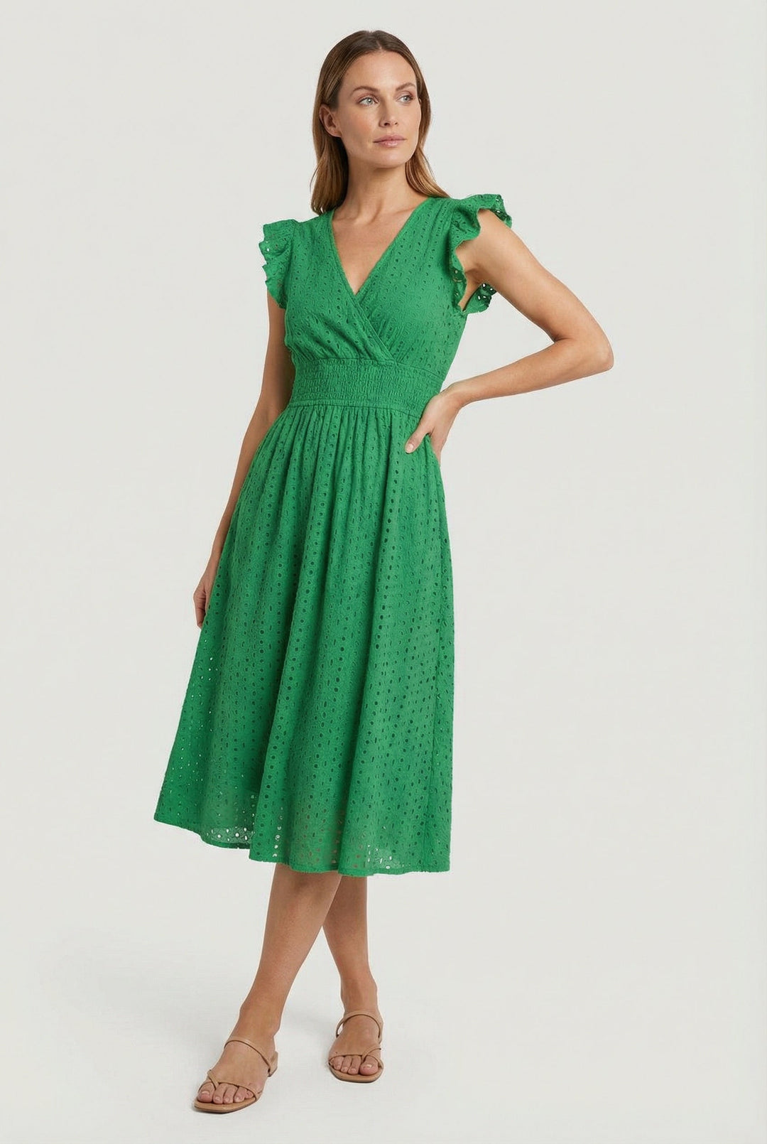Flared eyelet midi dress for women, with comfortable smocked waist and romantic ruffled sleeves.