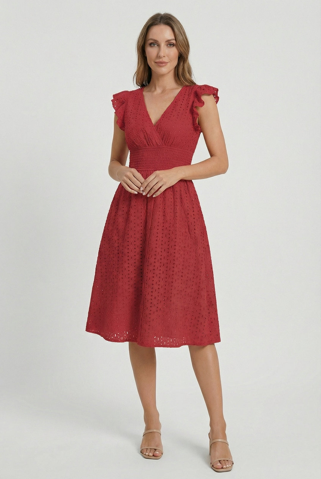 Flowy women's flared eyelet midi dress, ideal for sunny days with its stylish ruffled sleeves.