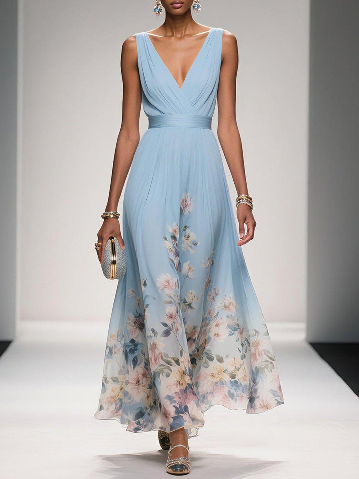 Women's flattering floral midi dress with deep V-neck, perfect for spring & summer occasions.