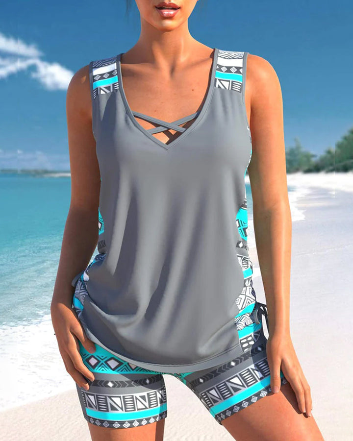 Front view of a women's tankini swimsuit, showcasing its flattering fit and tummy control feature for summer.