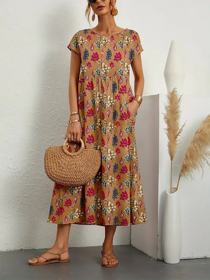Stylish women's floral A-line short sleeve dress, a versatile midi for casual or summer wear.