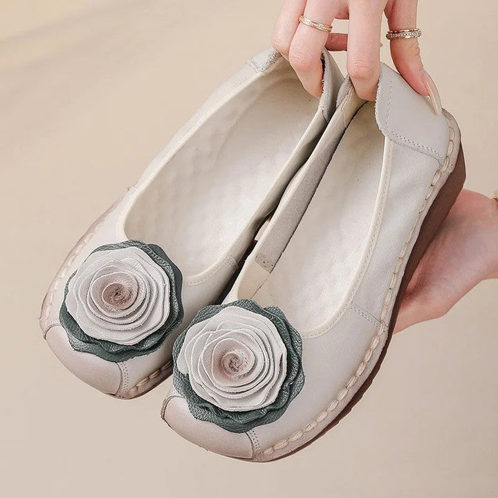 Women's floral appliqué slip-on comfort loafers for everyday style.