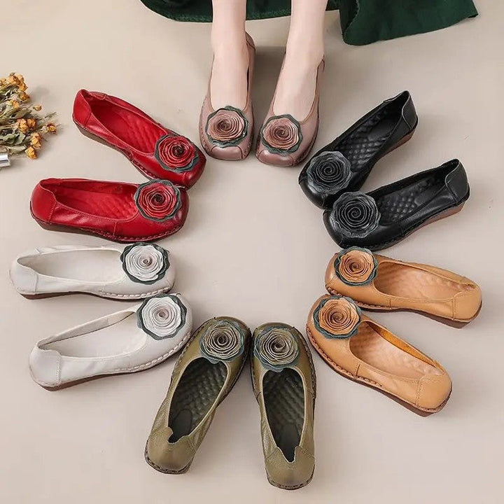 Womens casual comfort loafers, slip-on design with unique floral appliqué.
