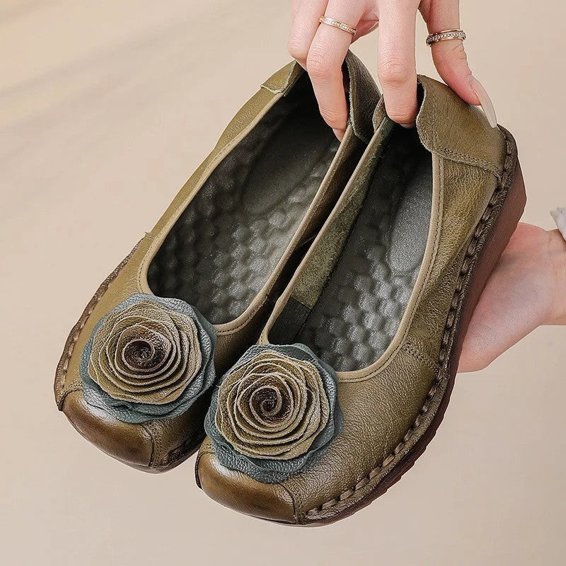 Stylish women's floral appliqué slip-on loafers, perfect for spring fashion.