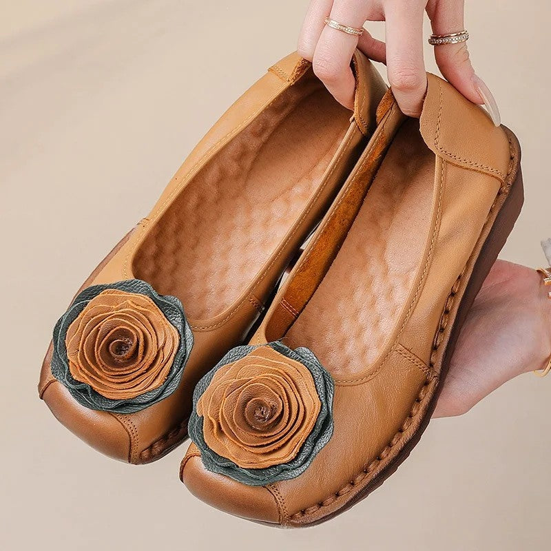 Soft women's comfort loafers, easy slip-on style with charming floral detail.