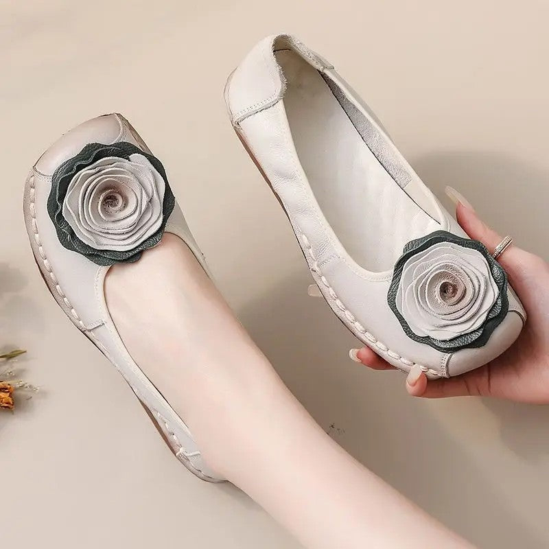 Elegant women's slip-on comfort loafers with beautiful floral appliqué.