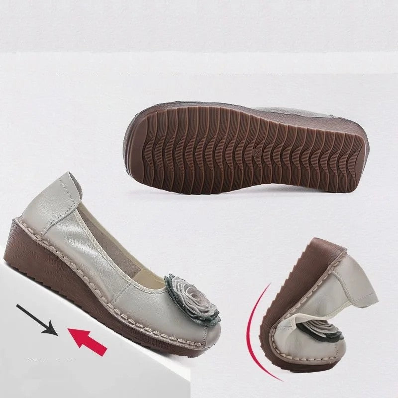 Modern women's floral appliqué comfort loafers, versatile slip-on footwear.