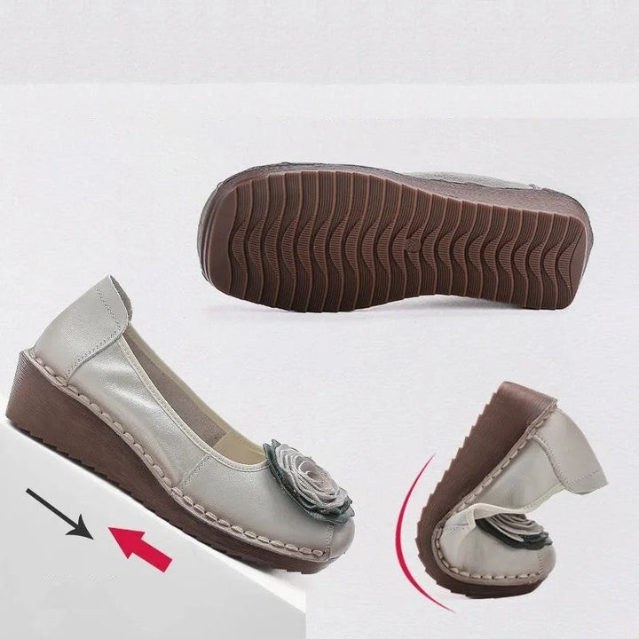 Modern women's floral appliqué comfort loafers, versatile slip-on footwear.