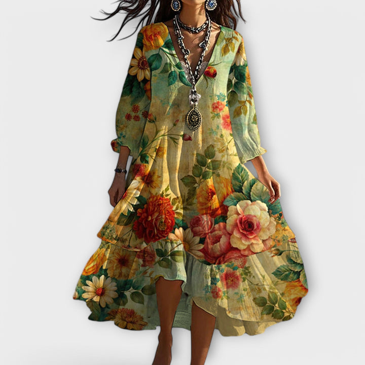 Women's floral boho maxi dress with a flowy silhouette and V-neck. Perfect for summer, beach, or resort wear.
