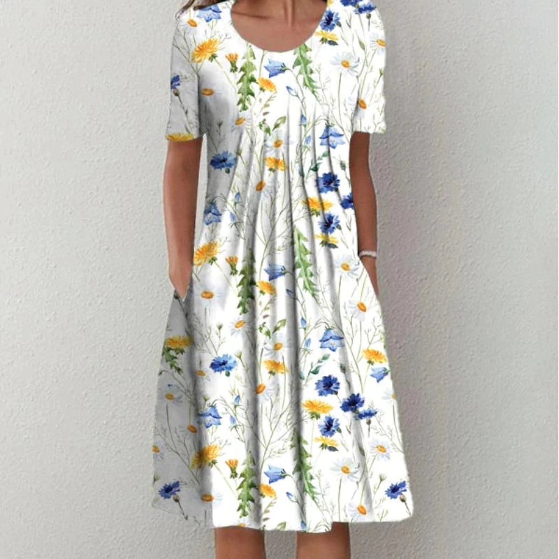 Comfortable women's floral print midi dress. Short sleeve, A-line casual summer dress with practical pockets.