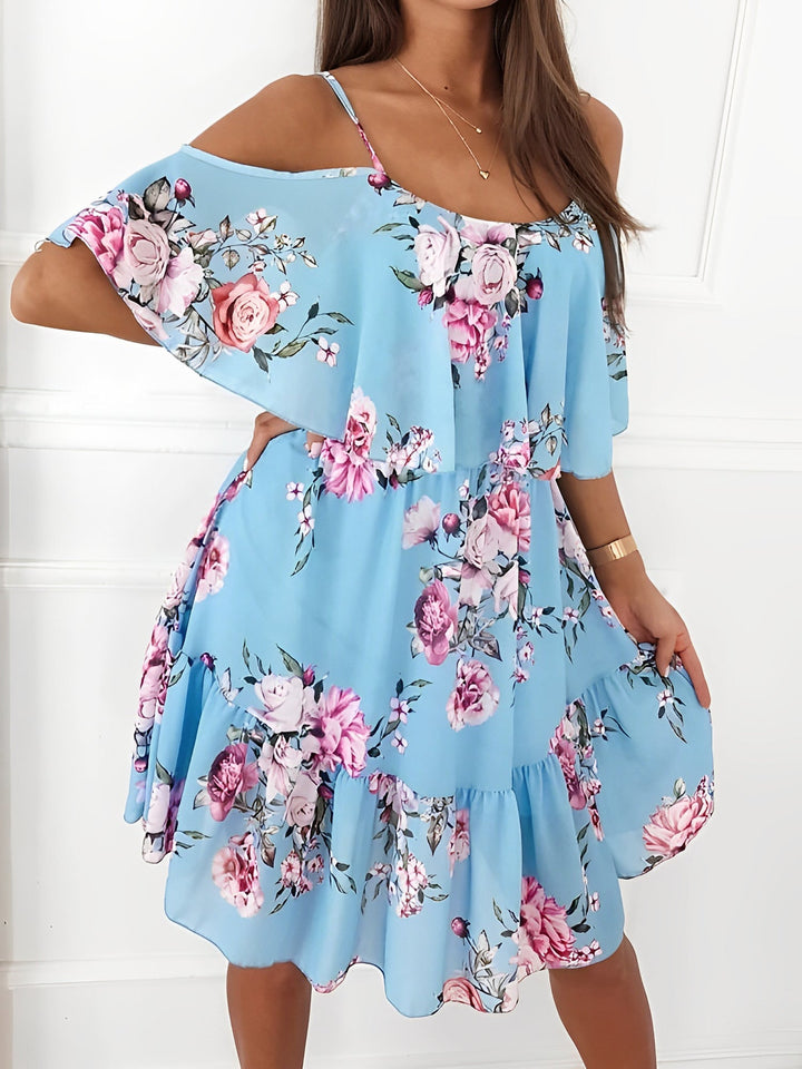 Floral pattern mini dress for women, featuring a trendy cold shoulder cut and flirty ruffle trim.