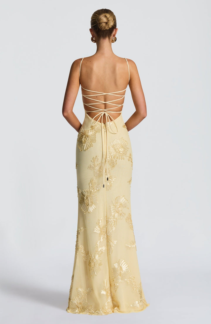 Beautiful floral corset maxi dress for women. Spaghetti strap design, perfect for spring wedding guests.