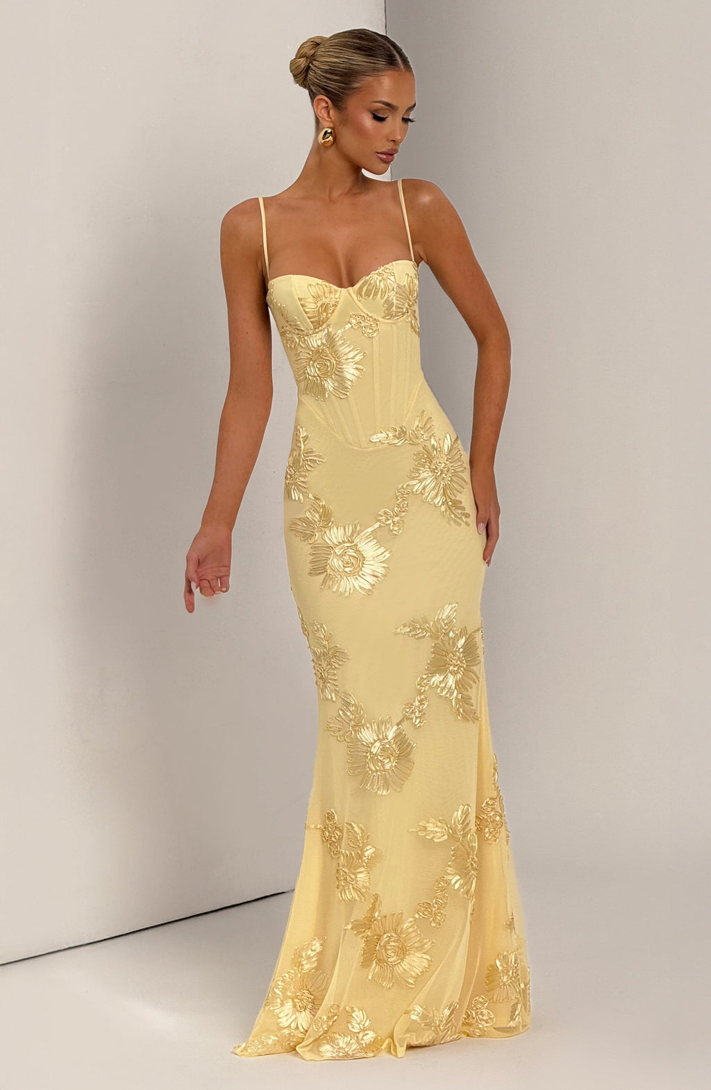 Women's elegant floral corset maxi dress. Spaghetti strap formal wear for spring/summer wedding guests.