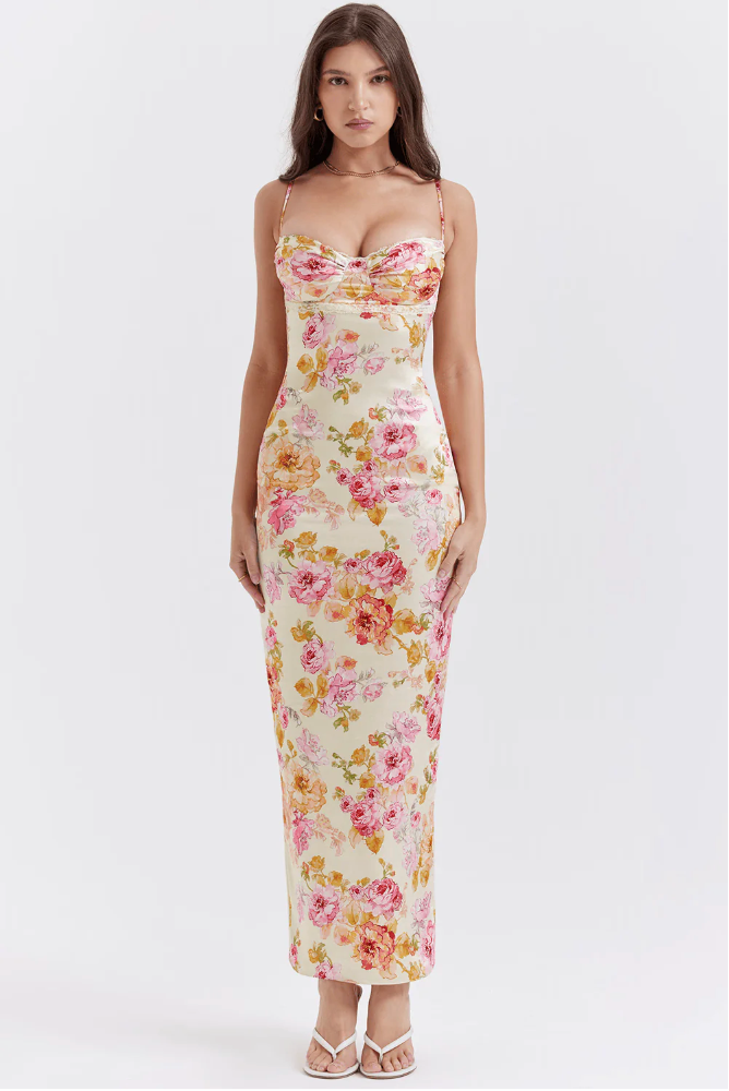 Chic women's floral corset maxi dress. Stylish wedding guest gown with a romantic vintage flair.