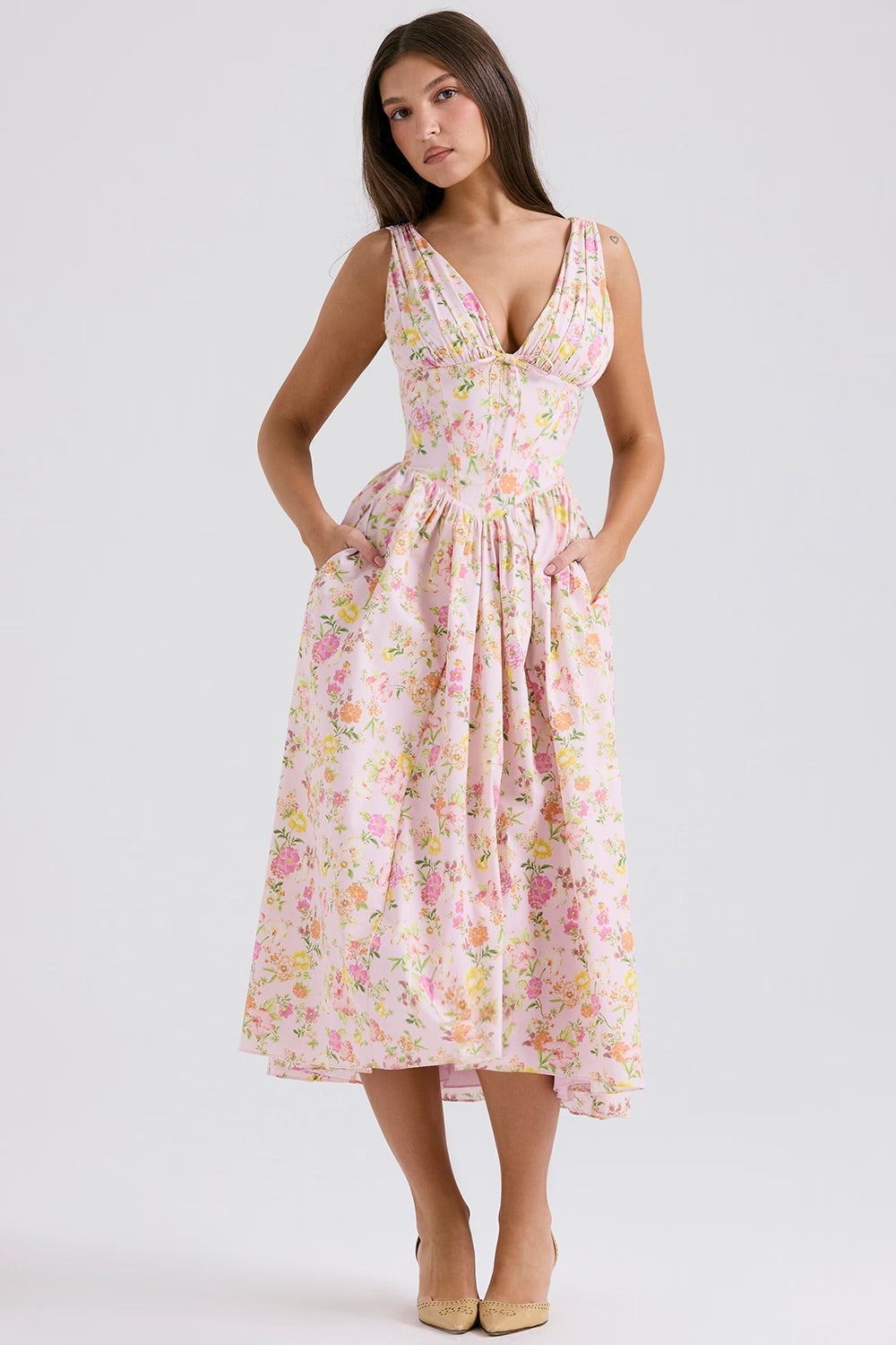 Elegant floral A-line midi wedding guest dress for women, featuring a stylish V-neck and corset detail.