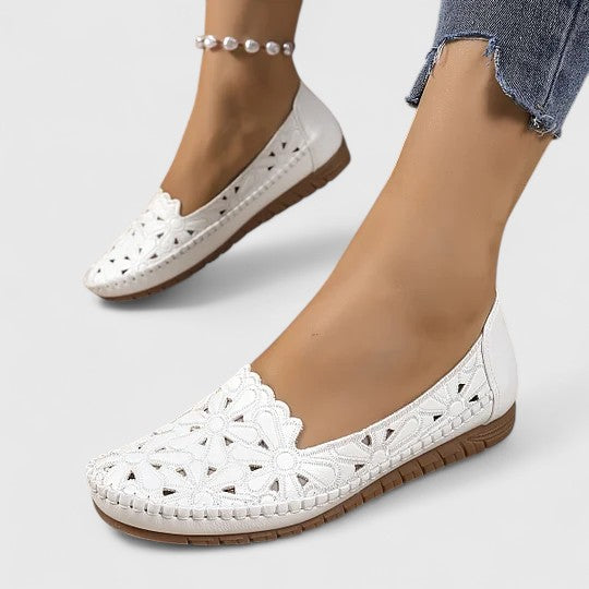 Stylish women's floral cutout slip-on flats, perfect for spring fashion & summer style. Comfortable round toe ballet shoes.